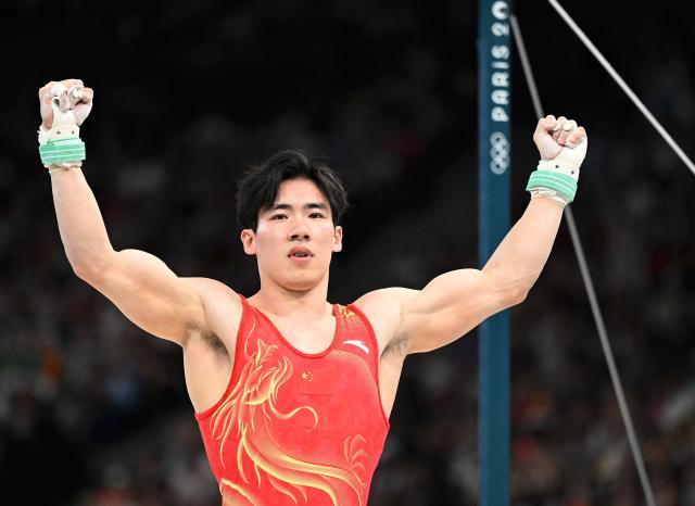 S14全球总决赛竞猜-迟到三年的奥运之约 “劳模”张博恒太不容易了